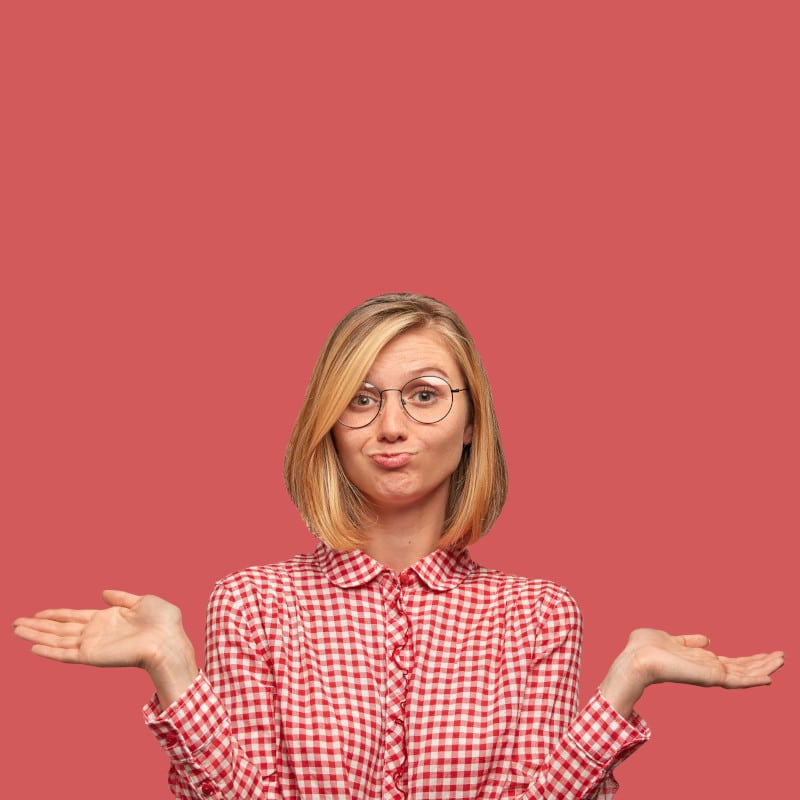 A woman shrugging her shoulders as if asking a question