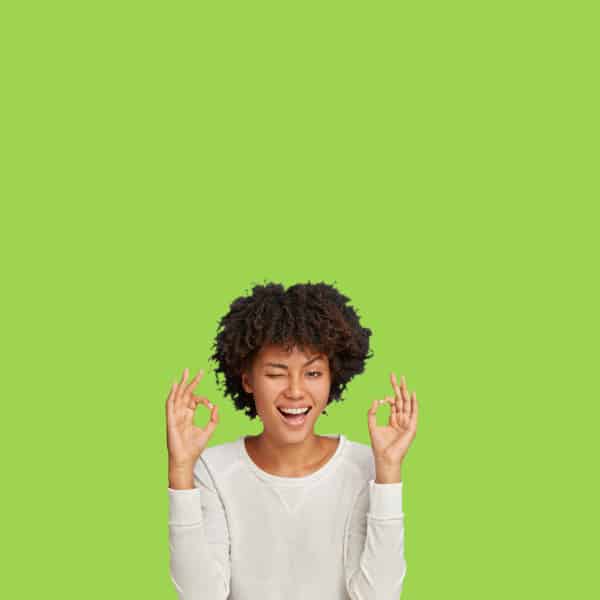 A woman signals her approval of TheOneStopWeb.Shop's support contract
