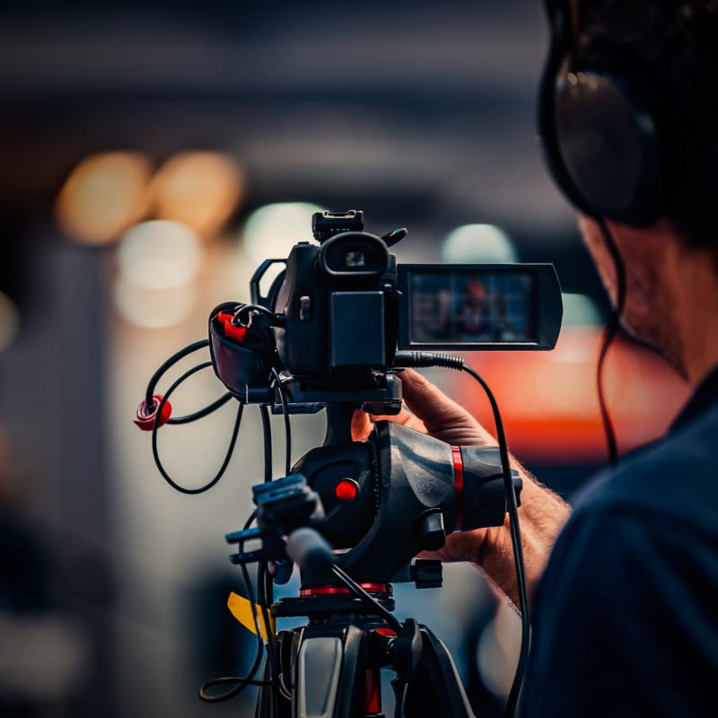 A videographer at a bespoke filming event