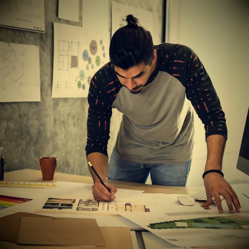 A web designer working hard on a bespoke website design