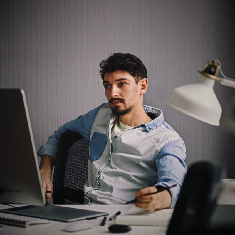 A man contemplates the policy statement for his online store