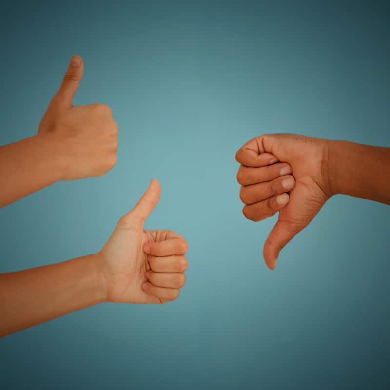 Two thumbs up and one thumbs down representing data gathered from an online poll