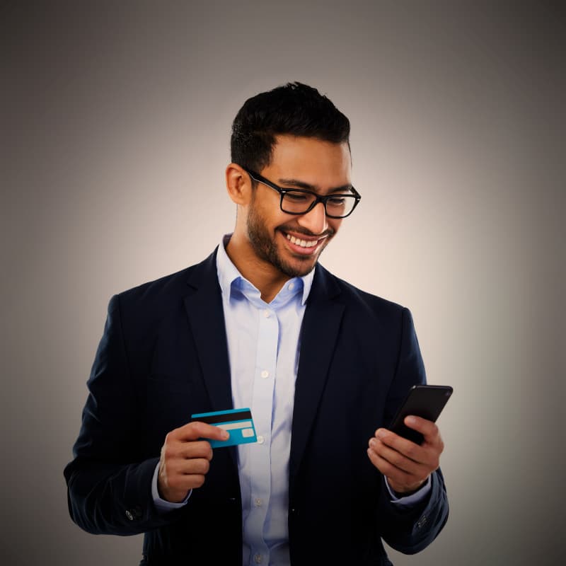 A man buys a product on his phone using a mobile WooCommerce store